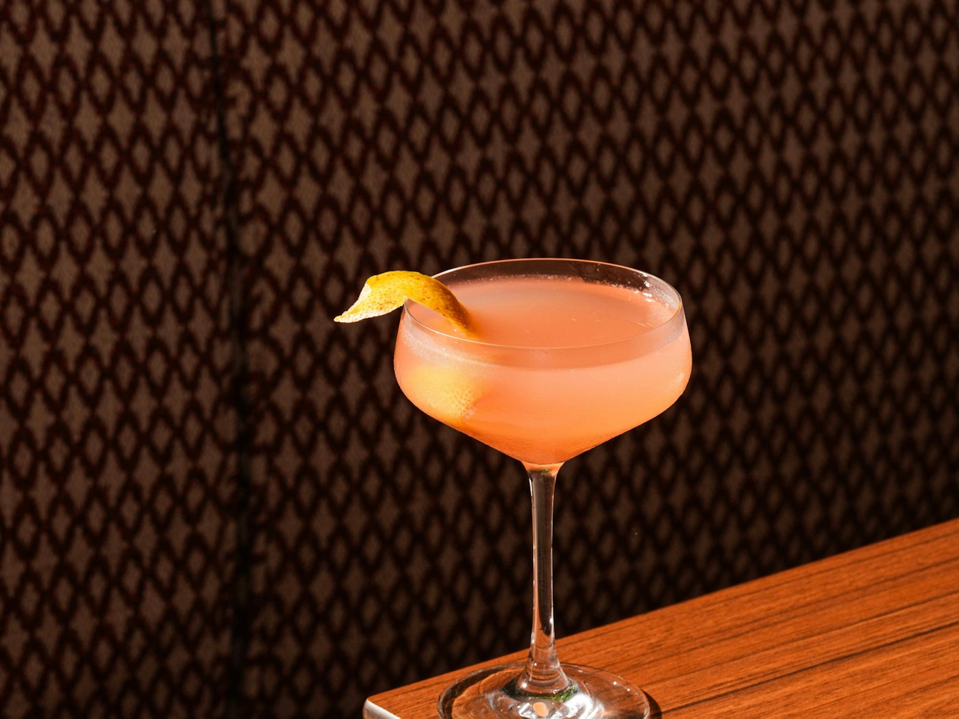 A cocktail at the bar at Kyma West Palm Beach